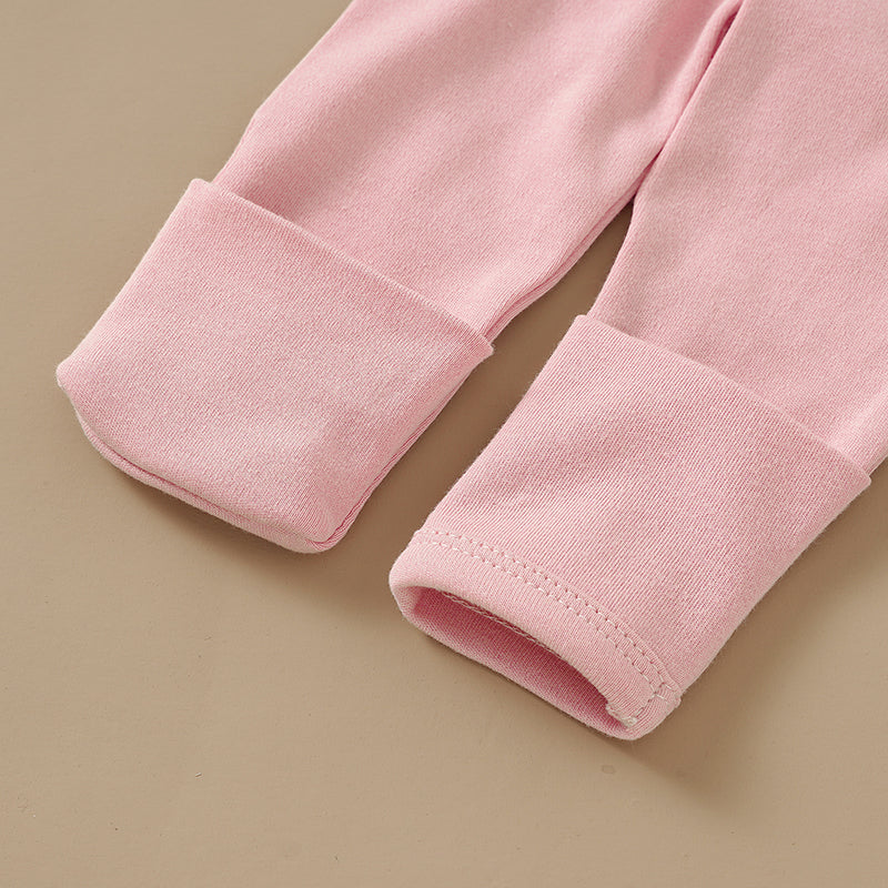 Close-up of pink kimono side-snap bodysuits cuffs by SOALSA soft fabric bodi na preklop