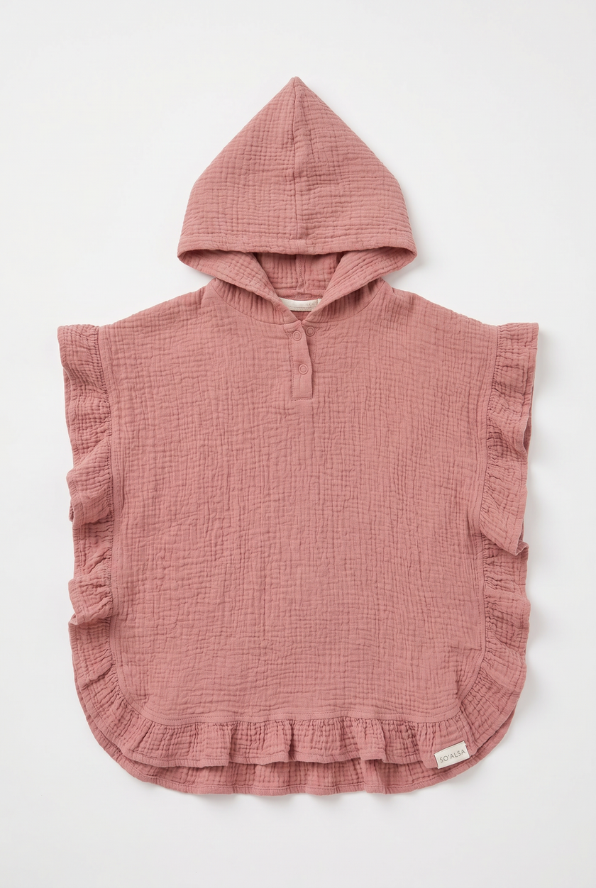 Pink hooded poncho with ruffled edges on a white background