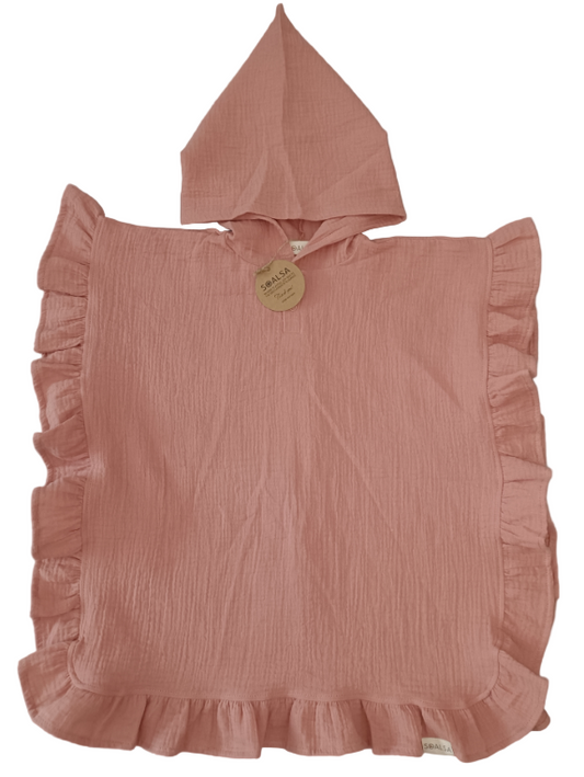 Pink hooded poncho with ruffled edges on a gray background