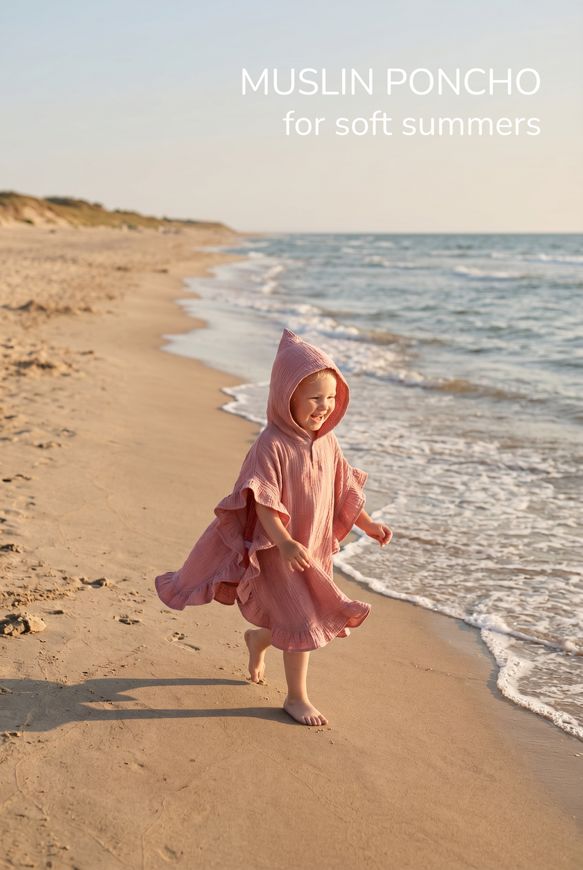 Child in a pink poncho walking on a beach with text 'Muslin Poncho for soft summers'.