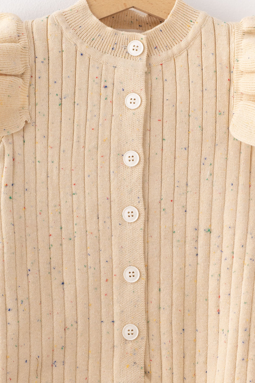 Beige ribbed sweater with button details on a hanger