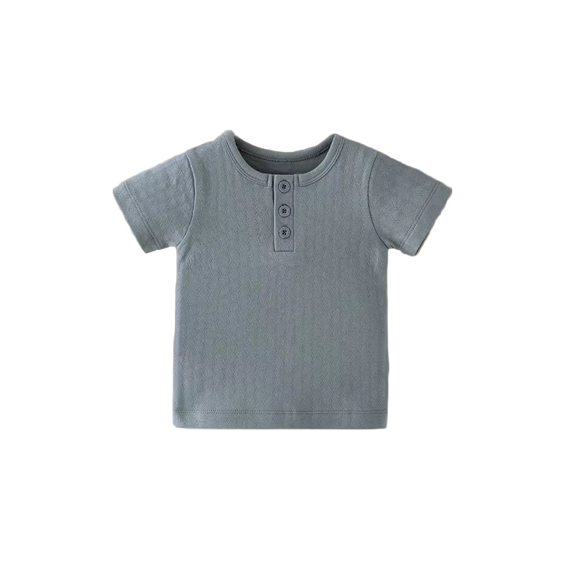 Children's blue short-sleeve shirt on a beige background