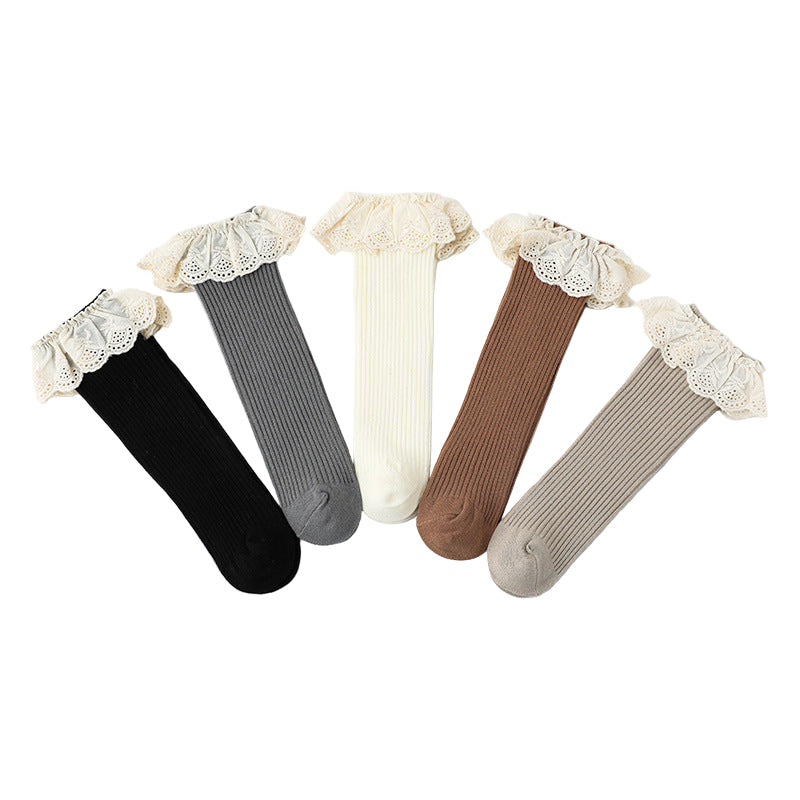 Set of five pairs of socks with lace trim in black, gray, white, brown, and beige on a light gray background.
